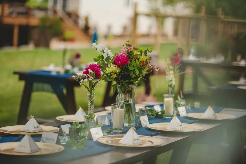 Dinner table set with flowers and candles